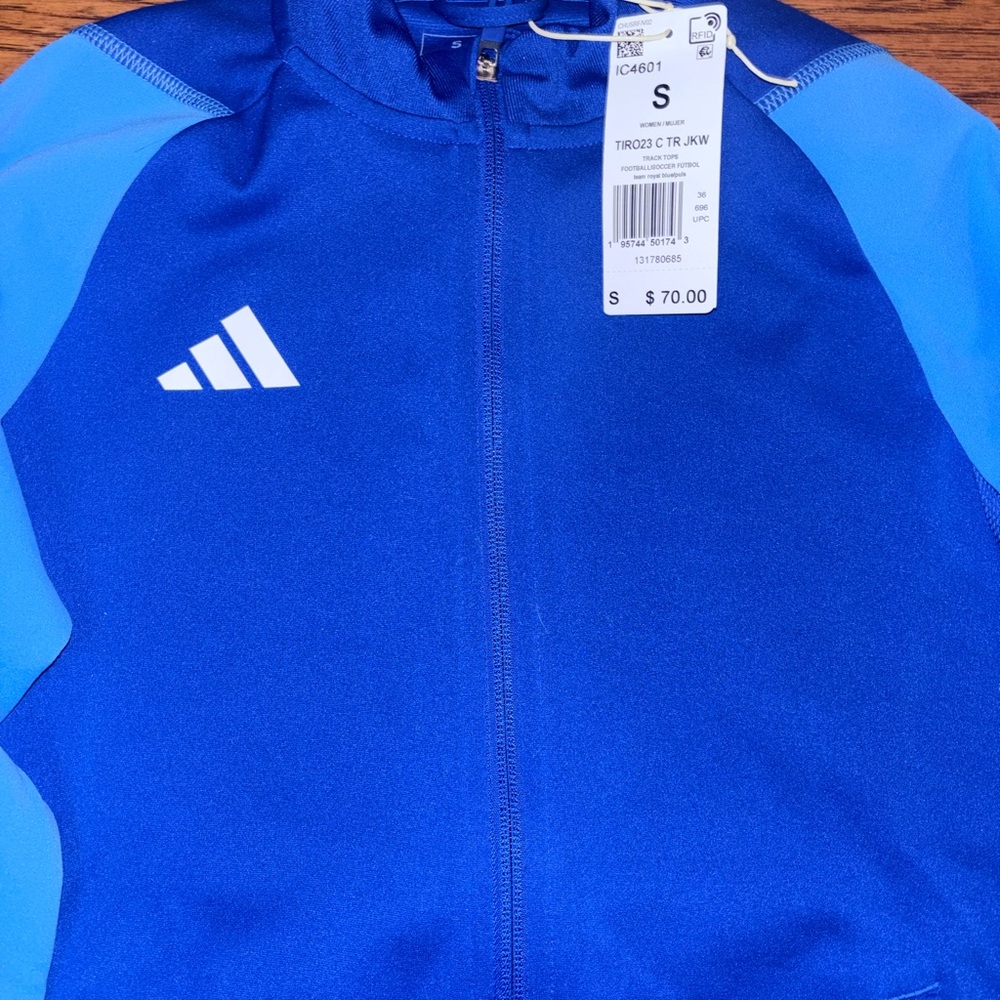 Adidas warm-up jacket Adult Small but fits older kid XL